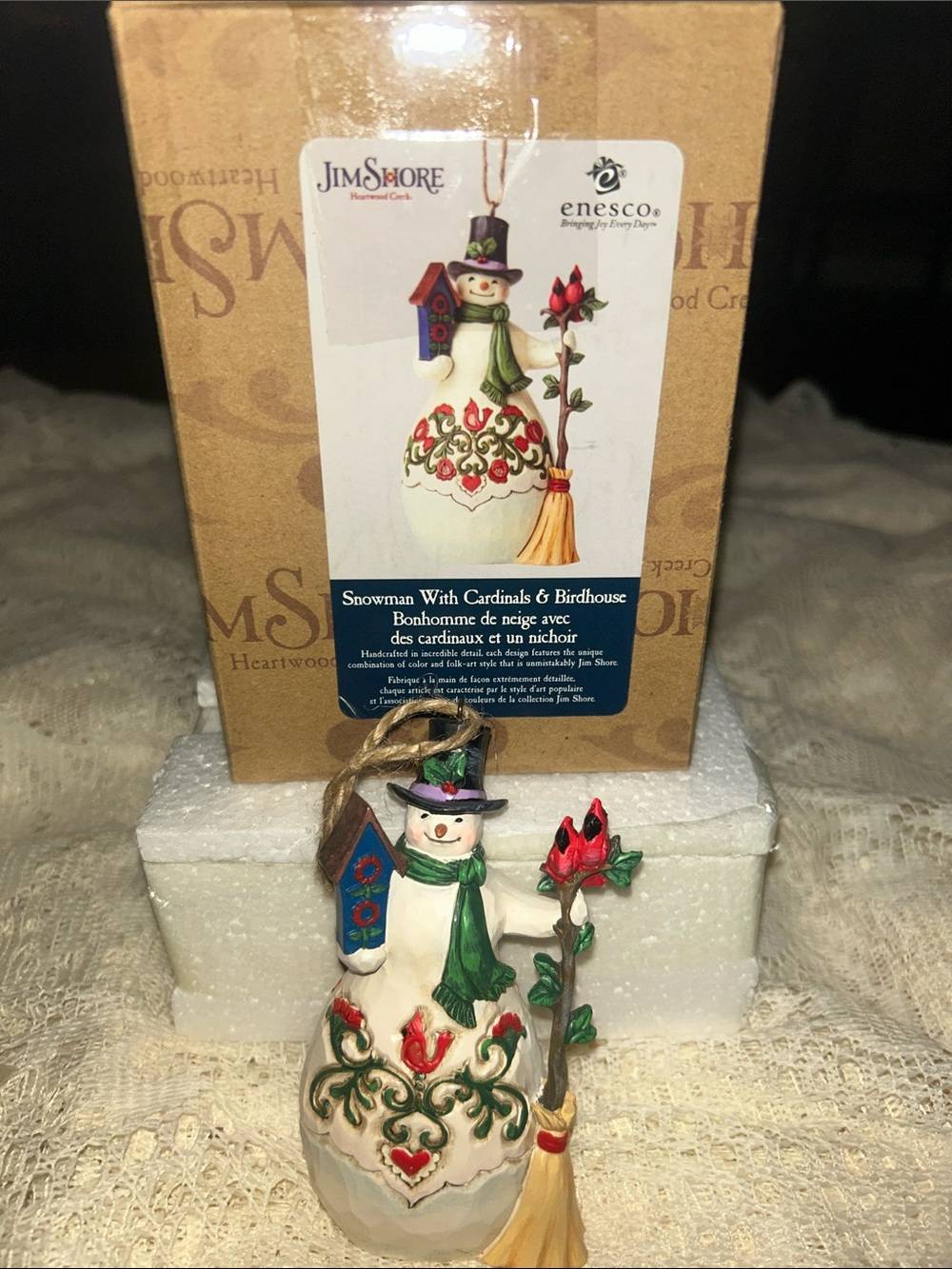 Jim Shore Snowman ornament with cardinals and birdhouse.